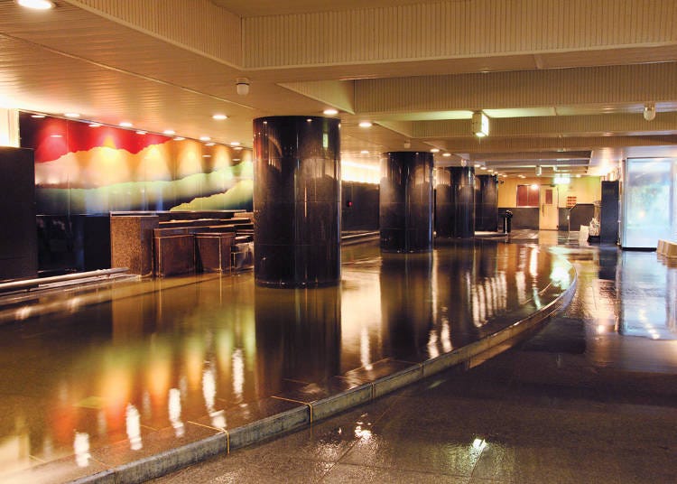 The men's bathroom, featuring a massive bathtub